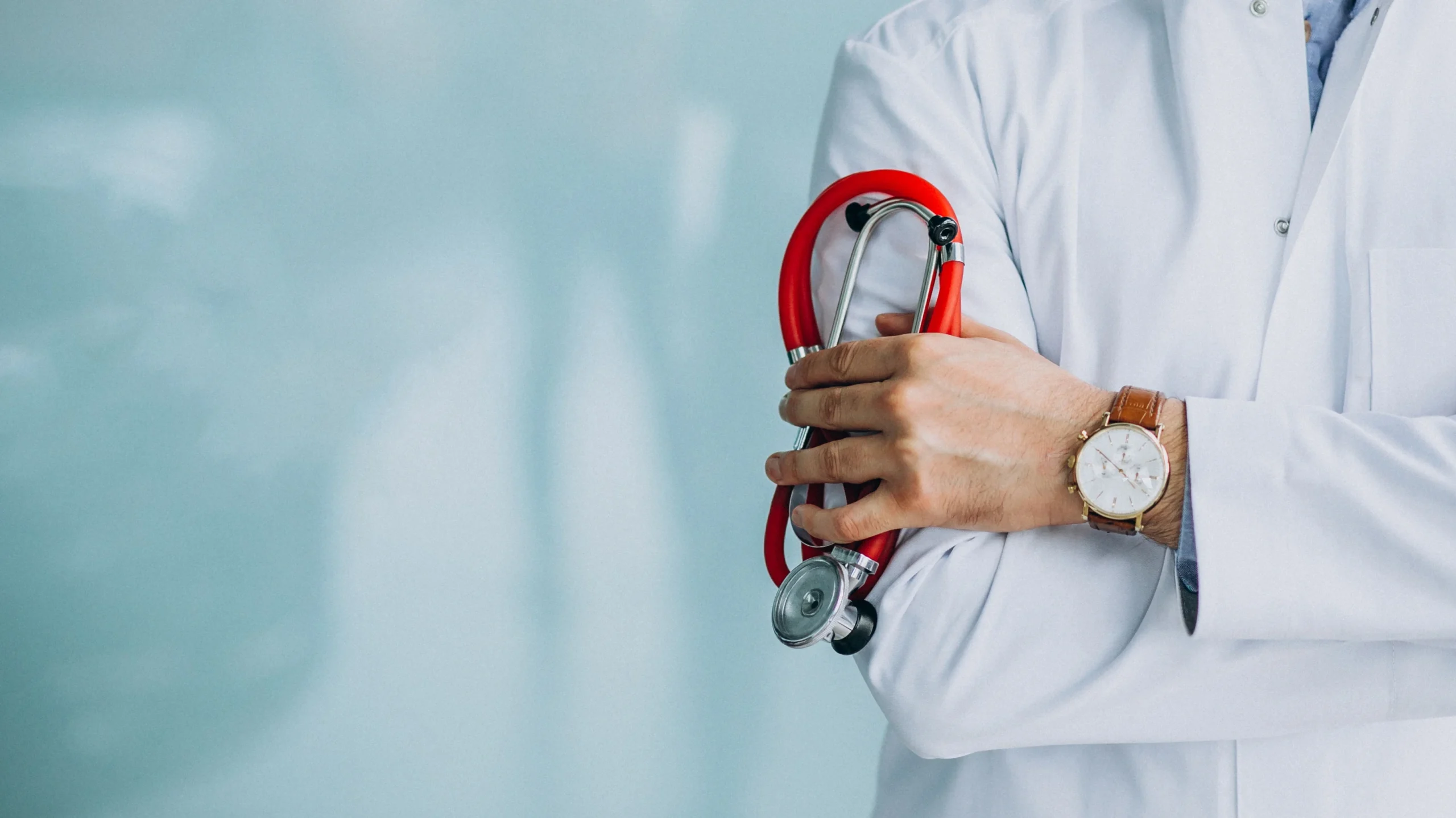A healthcare professional wearing a white lab coat and holding a red stethoscope, symbolizing medical expertise. The image addresses common menstrual health concerns, such as Why Does My Period Smell?